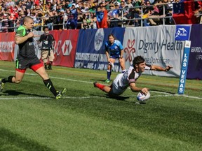 Justin Douglas scores against Wales at the 2014 USA Sevens. (Lorne Collicutt/Rugby Canada)