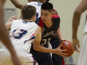 Harry Liu of Vancouver's Sir Winston Churchill Bulldogs in the semifinals of the Bill Kushnir Memorial against Abbotsford's Yale Lions last Friday in Ladner. (Gerry Kahrmann, PNG)