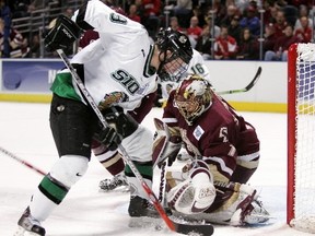 Back in the 2006 Frozen Four, Boston College's Cory Schneider stops North Dakota's Jonathan Toews. UND, along with Princeton, SFU and UBC face off beginning Friday in the 2014 Great Northwest  Showcase in Burnaby. (Photo -- Getty Images)