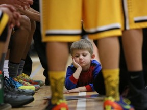 Yeah, but dad, who is No. 1? Panagioti Samonis, 4, son of Gleneagle assistant coach Petros Samonis, pondered the big question Saturday during the final of the Legal Beagle invite in PoCo. The Talons have moved into the coveted No. 1 spot in The Province's Big 10 Quad A ranks. (Kim Stallknecht, PNG photo)