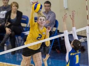 UBC Thunderbirds’ Lisa Barclay rises above the War Memorial Gym parquet on Saturday for one of her 13 kills as her No. 1-ranked team beat No. 2 Brandon 3-0. UBC improved to 15-1 in Canada West play with the win. (Bob Frid, UBC athletics)