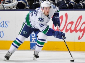 Jordan Schroeder finally gets back in the lineup on Monday against the Oilers. (Photo by Jamie Sabau/NHLI via Getty Images)