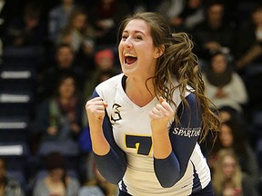 Trinity Western's Sophie Carpentier exults as her Spartans complete a weekend Canada West volleyball sweep at the Langley Events Centre. (Scott Stewart, TWU athletics)