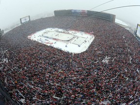 The NHL Winter Classic at Michigan Stadium on Jan. 1, 2014. AP photo.