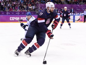 Ryan Kesler controls the puck during the Men's ice hockey Bronze Medal Game USA vs Finland at the Bolshoy Ice Dome during the Sochi Winter Olympics on February 22, 2014.     (ANDREJ ISAKOVIC/AFP/Getty Images)