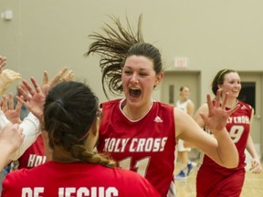 The face tells it all as Holy Cross' Amy Sprangers celebrates with the rest of her teammates following dramatic comeback win over Brookswood in Saturday's Fraser Valley senior girls Triple A basketball championship final at the Langley Events Centre. (Steve Bosch, PNG photo)