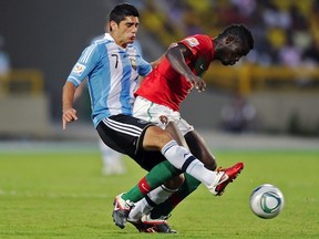Portugal´s player Pele (R) vies for the ball with Matias Laba of Argentina during their FIFA World Cup U20 football match at Jaime Moron Olimpic stadium in Cartagena, Colombia, on August 13, 2011. AFP PHOTO/VANDERLEI ALMEIDA (Photo credit should read VANDERLEI ALMEIDA/AFP/Getty Images)