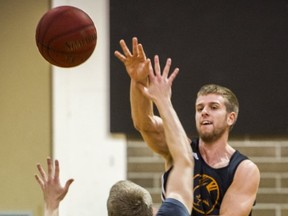 Langara's Daniel Hobden (right) and teammate Glenn Ruby battle during early-season practice at the CCAA school. The Falcons, ranked No. 1 in Canada, open as the favourites at the 2014 PACWEST basketball championships beginning Thursday at New Westminster's Douglas College. (PNG file photo)