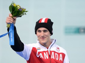 Denny Morrison of Canada wins silver in the men's 1,000 metre speedskating in Sochi at the Olympics Feb. 12, 2014. Getty Images photo.