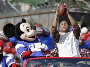 Malcolm Smith of the Seattle Seahawks, the Super Bowl MVP, at Disney World on Feb. 3, 2014. AP photo.