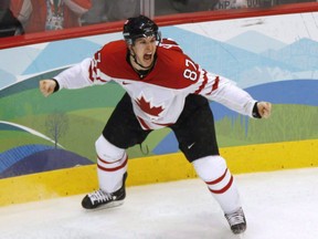 Sidney Crosby celebrates after scoring the winning goal at the 2010 Winter Olympics in Vancouver. Canadian Press file photo.