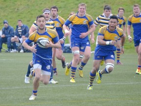 UBC's Bryan Tyrer makes a break in the 2013 World Cup 2nd leg vs Cal-Berkeley. Will veterans like Tyrer and Alex Kam (right) make a difference against the American powerhouse? (Chris Weyell/UBC Rugby photo)