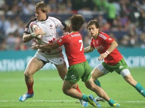 Harry Jones on the charge for Canada during their Pool C match at the Hong Kong Sevens vs Portugal (Mark Metcalfe/Getty Images)