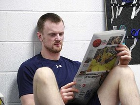 Henrik Sedin checking out what all the fuss is about over The Provies