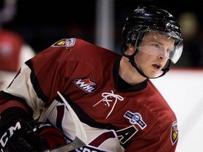 Vancouver Giants defenceman Brett Kulak looks on during the pre-game skate before a WHL hockey game against the Tri-City Americans in Vancouver, B.C., on Saturday November 16, 2013. The Calgary Flames have signed Kulak to a three-year, US$2.45-million entry-level contract.THE CANADIAN PRESS/Darryl Dyck