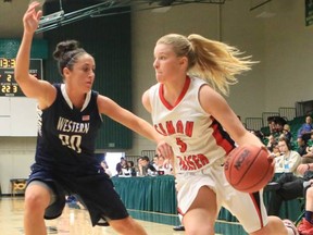 SFU's Ellen Kett (right) drives against Western Washington in NCAA Div. 2 west region opener Friday in Pomona, Cal. (Scott Wu, NCAA photo)