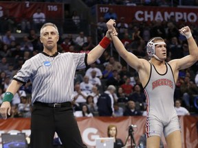 Ohio State's Logan Stieber won a national title. Now the AD gets paid. (AP Photo/Sue Ogrocki)