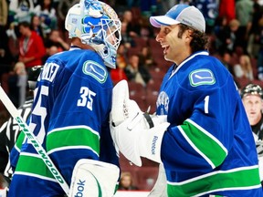 The Canucks' Roberto Luongo and Cory Schneider. File photo.