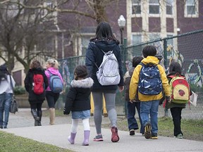 Students make their way home from Lord Roberts Elementary in Vancouver on Friday.