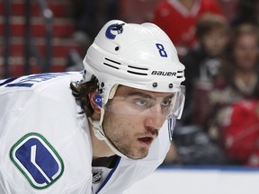 Chris Tanev will he hard to replace when the Canucks take on the Sharks on Thursday night.  (Photo by Joel Auerbach/Getty Images)