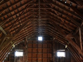 The hayloft of a hipped-roof barn.