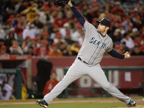 ANAHEIM, CA - APRIL 02:  James Paxton #65 of the Seattle Mariners pitches against the Los Angeles Angels during the fourth inning at Angel Stadium of Anaheim on April 2, 2014 in Anaheim, California.  (Photo by Harry How/Getty Images)