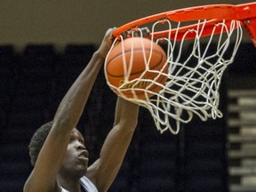 B.C. Christian's Kosia Cauw dunks in the third quarter of Sunday's BC high school boys all-star game in Langley. (Ric Ernst, PNG photo)