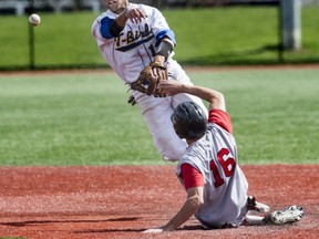 UBC's Matt Spillman delivers the second half of a double-play ball during second half a Friday doubleheader against Redding, Cal.'s Simpson Redhawks. (Steve Bosch, PNG photo)