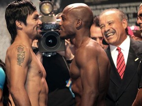 Manny Pacquiao and Timothy Bradley both on weight ahead of Saturday's championship bout. Photo: Mary Ann Owen