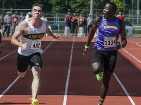 It was that close! Rutland's Jerome Blake (right, 10.94 seconds) edged  Felix Rankin of Gibsons-Elphinstone (11.04) in the senior varsity 100 metre final at the BC high school championships Friday in Langley. (Steve Bosch, PNG)