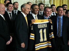 That's Jim Benning at far right as the then-Stanley Cup champion Boston Bruins visit U.S. president Barack Obama at the White House.