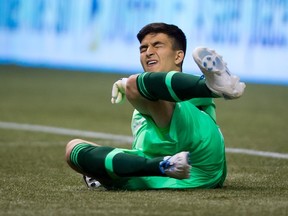 Vancouver Whitecaps goalkeeper Marco Carducci reacts after allowing a goal to Toronto FC's Dwayne De Rosario in the Amway Canadian Championship shoot out. THE CANADIAN PRESS/Darryl Dyck