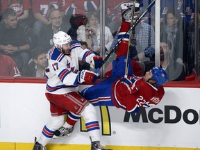 Not long before Dale Weise created a couple of beautiful goals, and had his helmet knocked off, John Moore took Weise out in a huge hit.