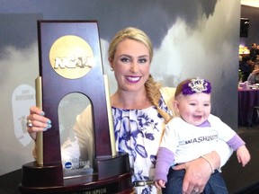 Langley's Danielle Lawrie with four-month-old daughter Madison this past Saturday during the former Brookswood grad's jersey retirement ceremony at the University of Washington. (Photo -- Huskies athletics)