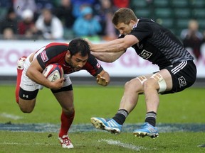 His knee apparently healed, Phil Mack looks set to return to the lineup , just in time. (Andy Buchanan/AFP/Getty Images)