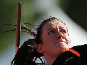 Ex-UBC star Liz Gleadle broke her own Canadian record in the javelin during a meet Saturday in Calgary. (CP photo)