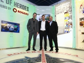 Former captains (left to right) Trevor Linden, Markus Naslund and Stan Smyl of the Vancouver Canucks stand together at Rogers Arena in December 2010 before the team retired Naslund's jersey.
(Photo by Jeff Vinnick/NHLI via Getty Images)