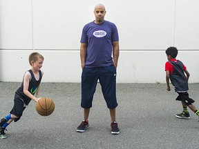 Filmmaker Michael Hamilton with some of the youngsters he coaches in Surrey. He has just completed a documentary about Steve Nash's career, as well as four episodes that pick up where the film leaves off.