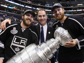Kings assistant coach John Stevens, here with Mike Richards (left) and Jeff Carter after Los Angeles won the Stanley Cup in 2012, is a prime candidate to be the Canucks next head coach.
 (Photo by Bruce Bennett/Getty Images)