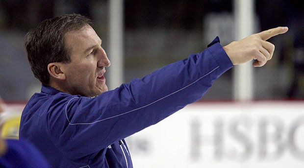 Former Vancouver Canucks tough guy Tim Hunter, pictured in 2010 as a Toronto Maple Leafs assistant coach, appears to be the front-runner for the head coaching job with the WHL Giants.