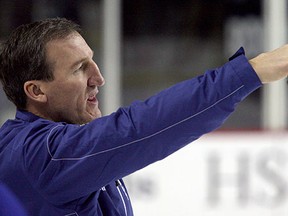 Former Vancouver Canucks tough guy Tim Hunter, pictured in 2010 as a Toronto Maple Leafs assistant coach, appears to be the front-runner for the head coaching job with the WHL Giants.