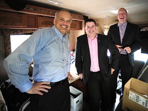 Tri-Cities mayors Richard Stewart (Coquitlam), left, Mike Clay (Port Moody) and Greg Moore (Port Coquitlam) get cosy in their RV before heading east. (Nick Procaylo/PNG files)