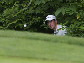 Nick Taylor chips the ball onto the 18th green during  the final day of Vancouver Open at Fraser view Golf Course in Vancouver, BC, June 15, 2013.   (Arlen Redekop / PNG staff photo)