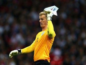 Joe Hart didn't get hit by the plane, he merely disposed of it. (Photo by Clive Rose/Getty Images)