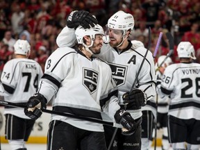 If Anze Kopitar saw his teammate fall off the bench like he did, would he still have given Drew Doughty such a hearty welcome? (Photo by Bill Smith/NHLI via Getty Images)