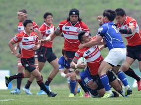 Watch for outside centre Male Sau (being tackled) to make a big impact for Japan. ED JONES/AFP/Getty Images