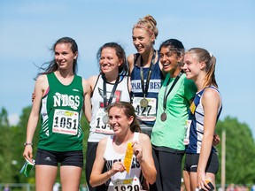 Four of the top five finishers in 800-metre senior girls final Saturday at the B.C. high school track and field championships in Langley are seniors headed to collegiate careers next season at Simon Fraser. They are Miryam Bassett (far left), Alana Mussatto (second left), Jasmine Gill (second right) and Sophie Dodd (kneeling). Also pictured are Grade 11s Addy Townsend (centre) and Grace Thompson. (Photo by Vid Wadhwani)