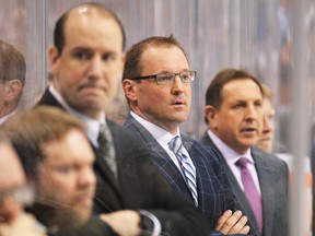 Former Penguins head coach Dan Bylsma, centre, was in Vancouver on Tuesday. (Photo by Jamie Sabau/Getty Images)