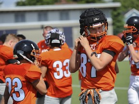 New Westminster Hyacks' senior and JV teams have begun to wear Guardian caps as a preventative measure during practice. (Jason Payne, PNG photo)