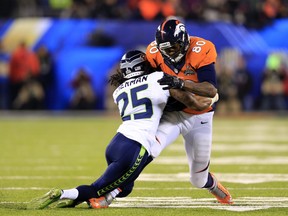 Richard Sherman demonstrates the technique Pete Carroll has brought to the Super Bowl champions. (Photo by Rob Carr/Getty Images)